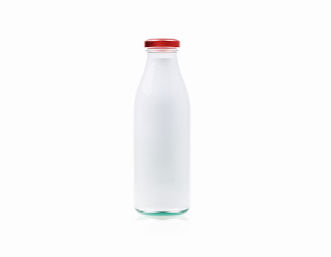 White glass milk bottle on white background. Horizontal composition.