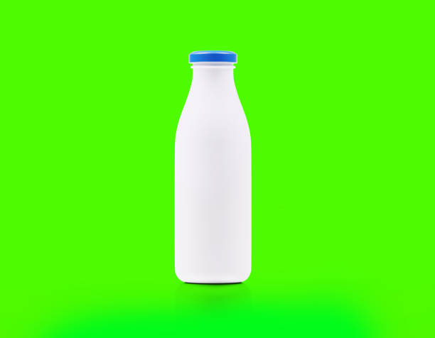 istock White Plastic Milk Bottle With Blue Lid On Green Background 1555695261
