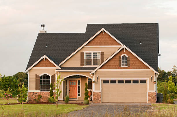 istock Front exterior of two story house with garage 155569710