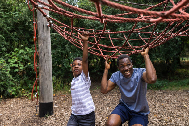 istock Playing at The Park With Dad 1555743730