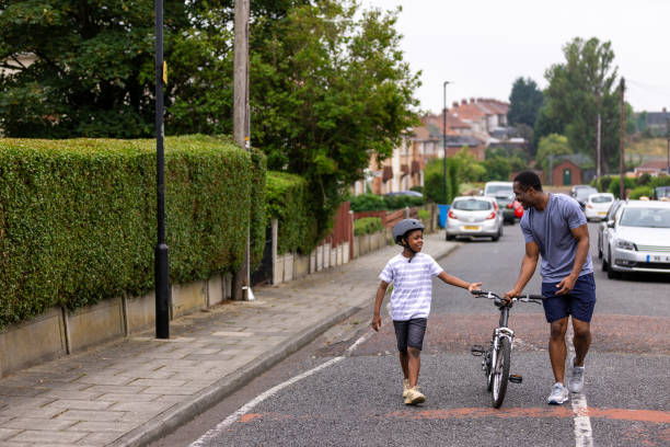 istock Bike Lesson With Dad 1555746439