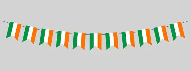 Vector illustration of Ireland flag garland, pennants on a rope for party, carnival, festival, celebration, st patricks day, bunting decorative pennants, vector illustration
