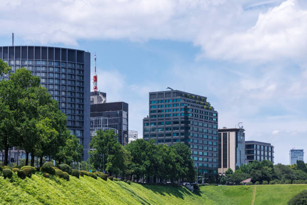 istock Beautiful blue sky and city buildings 1555759138