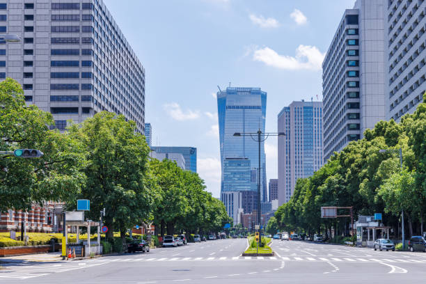 istock Beautiful blue sky and city buildings 1555762402