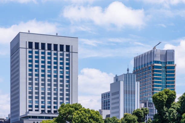 istock Beautiful blue sky and city buildings 1555763994