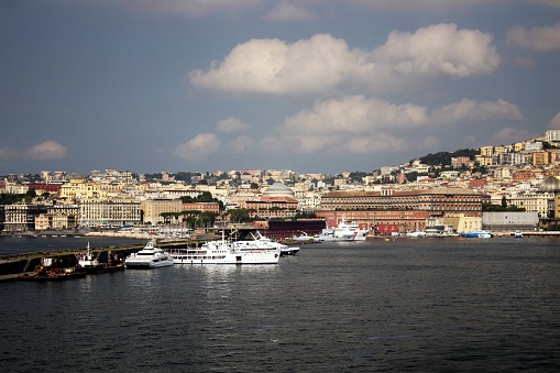 evocative image of the view of the port of Naples from the sea on a line ferry