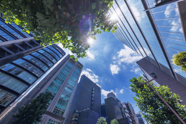istock Beautiful blue sky and city buildings 1555768139