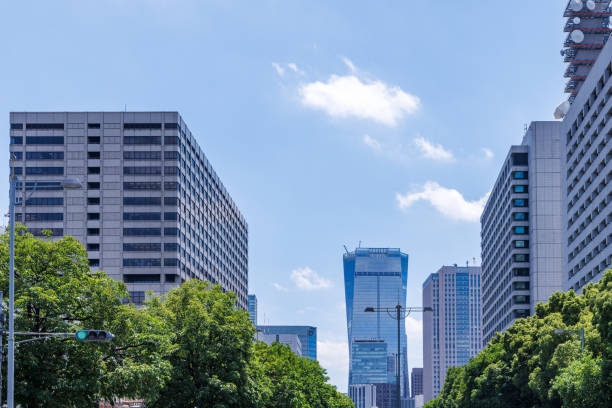 istock Beautiful blue sky and city buildings 1555768279