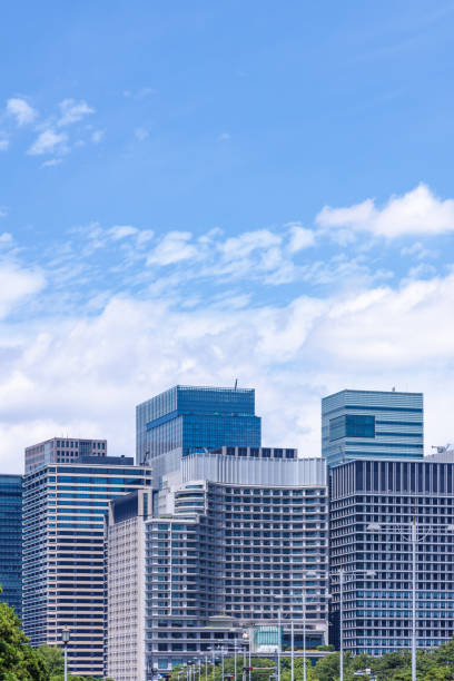 istock Beautiful blue sky and city buildings 1555771495