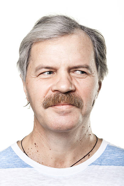 istock mature man looking to the right isolated on white background 155578070