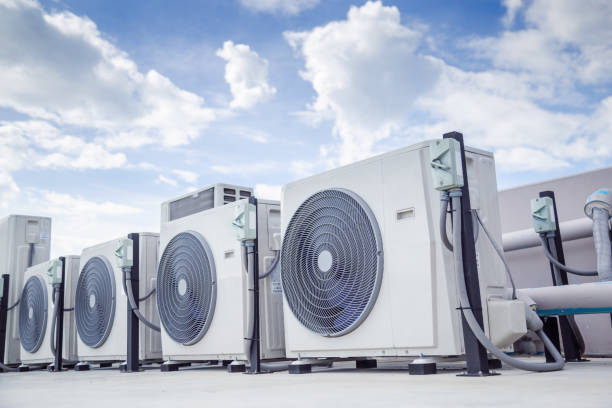 istock Air conditioning outdoor unit compressor install outside the building. 1555794960