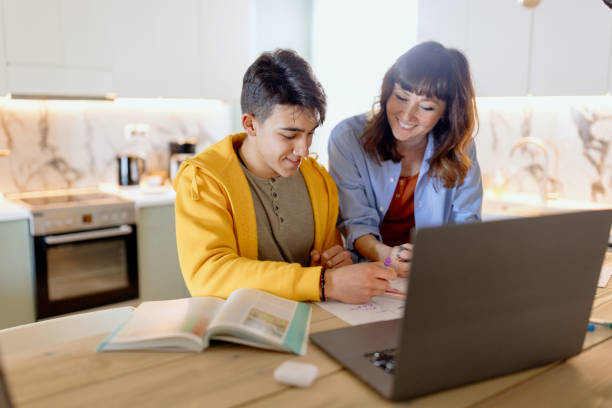 istock Mother and son bonding at home 1555804011