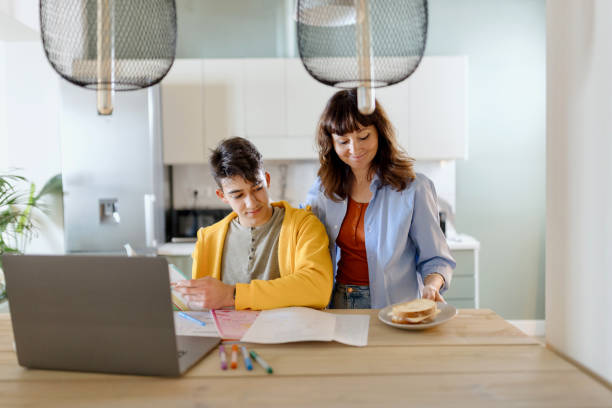 istock Mother taking care of her son 1555807133