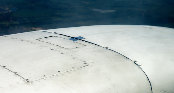 A closeup of the cowling of a small aircraft's engine.