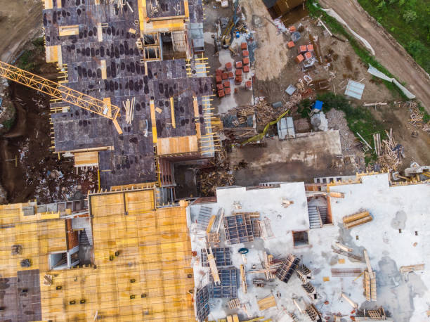 istock Drone View Of The Rooftop Of A Building In Construction 1555823329