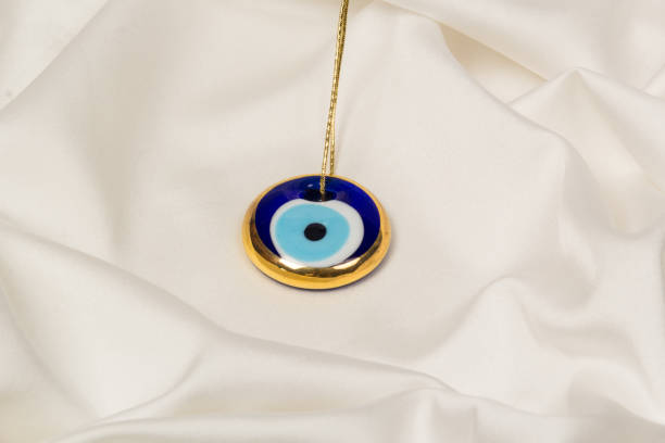 istock Glass Evil Eye Symbol  on White Background. Turkish Traditional Amulet. 1555866000