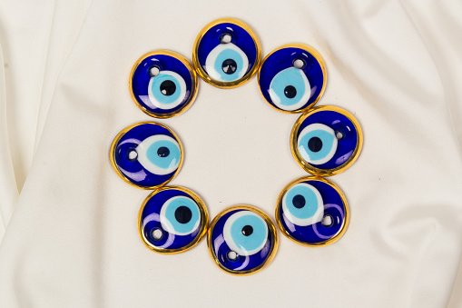 Glass Evil Eye Symbol  on White Background. Turkish Traditional Amulet.