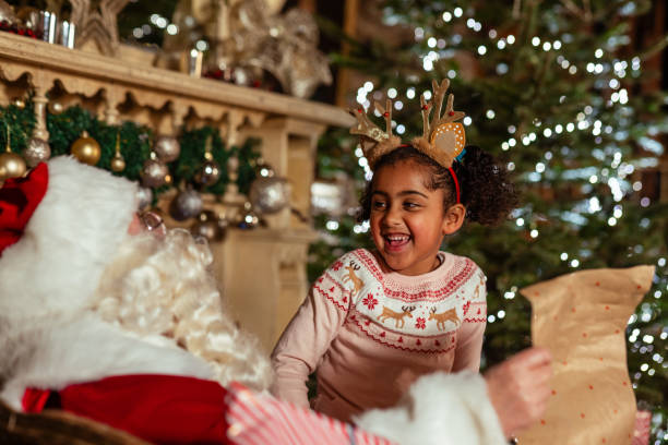 istock Girl Meeting Santa 1555881090