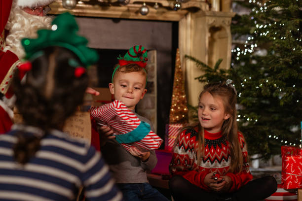 istock Children at Santas Grotto 1555882203