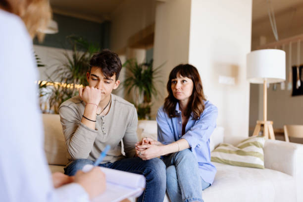 istock Mother and son on a psychotherapy 1555891821