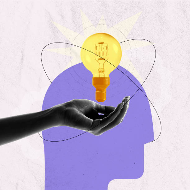 istock Female hand holding lightbulb over head silhouette symbolizing creative ideas. Contemporary art collage. Conceptual design 1555900186