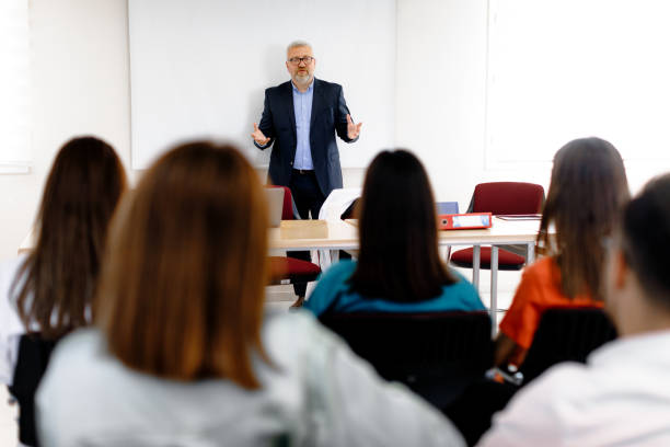 istock Empowering Knowledge Exchange: Diverse Audience at Business Conference 1555908413