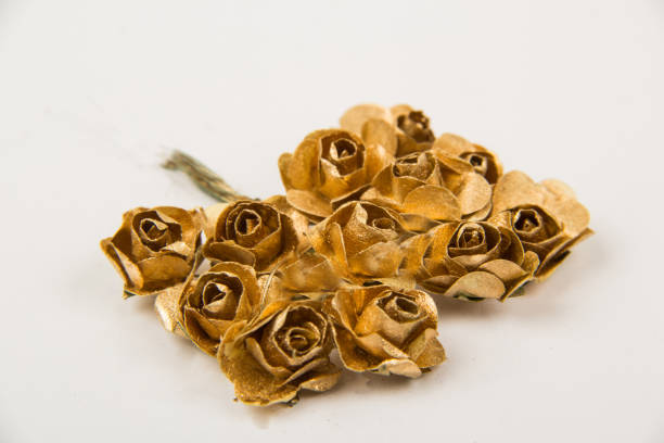 istock Beautiful wedding boutonniere artificial flower on white background 1555914478