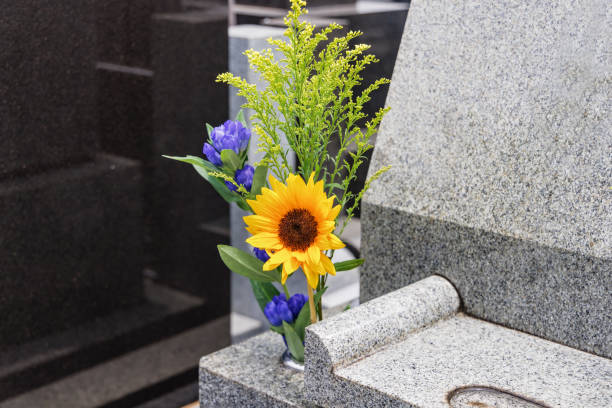 istock Beautiful Buddha flowers offered at the grave 1555916783