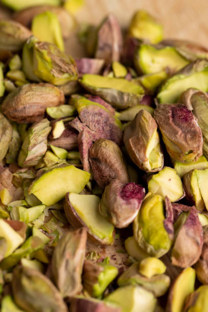 istock Crispy delicious pistachios with salt on the table 1555920326