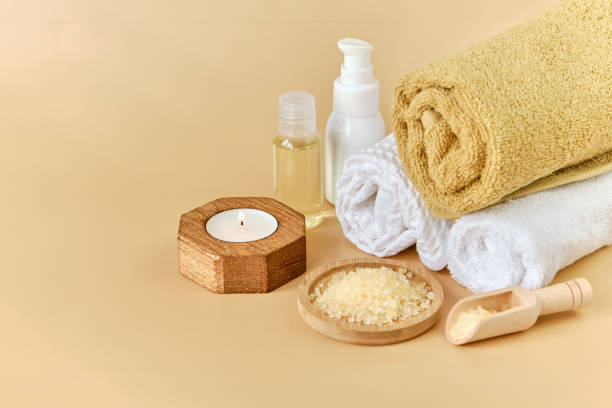 istock Set for SPA procedures, towels, salt, aroma oil 1555920888