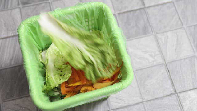 throw vegetable waste in the trash