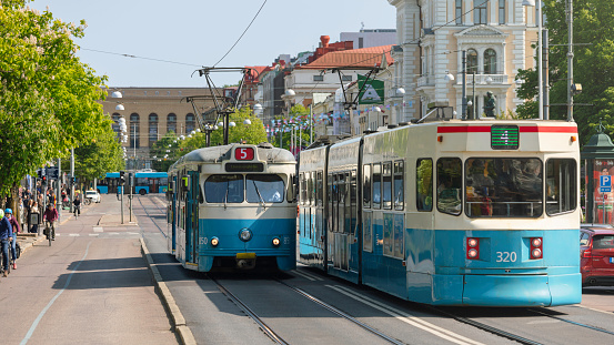 Two trams in the popular street Avenyn (Kungsportsavenyen) in central Gothenburg, Sweden.