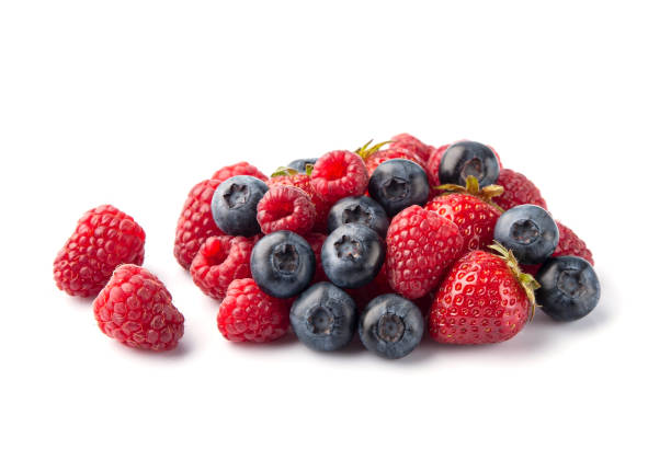 istock Sweet blueberries and raspberry with leaves 1555939543