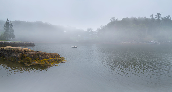 Foggy morning seascape at Boothbay Harbor in Lincoln County, Maine