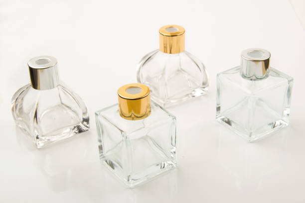 istock Small empty transparent glass vial on white background 1555941689