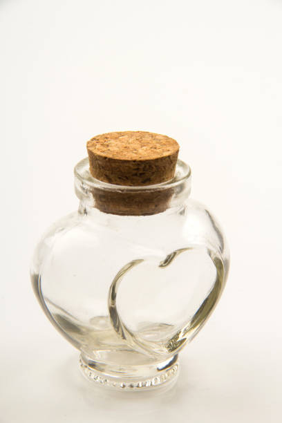 istock Small empty transparent glass vial on white background 1555943349
