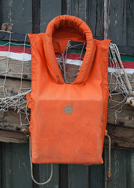 old colete salva-vidas - life jacket isolated red safety imagens e fotografias de stock