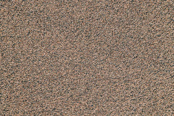 istock sand beach background texture, capturing the natural beauty and unique patterns found in the grains of sand. 1555946786