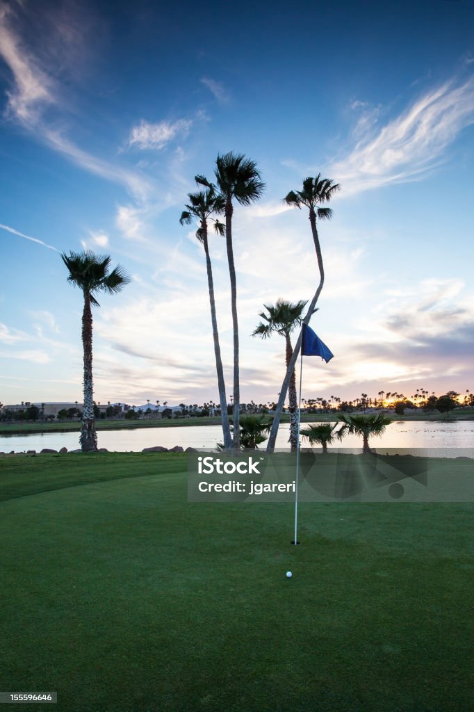 Golfa o zachodzie słońca - Zbiór zdjęć royalty-free (Dziura)