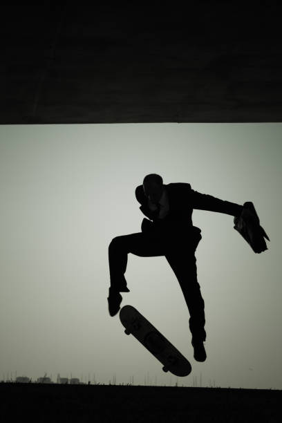 istock Skateboarder businessman in a suit 155596689