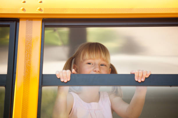 istock Happy Young Girl on School Bus 155597395