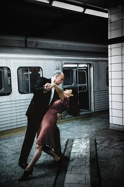 Mature Couple Dancing In The Subway
