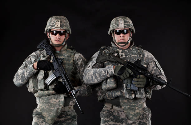 Two American Soldiers With Rifle
