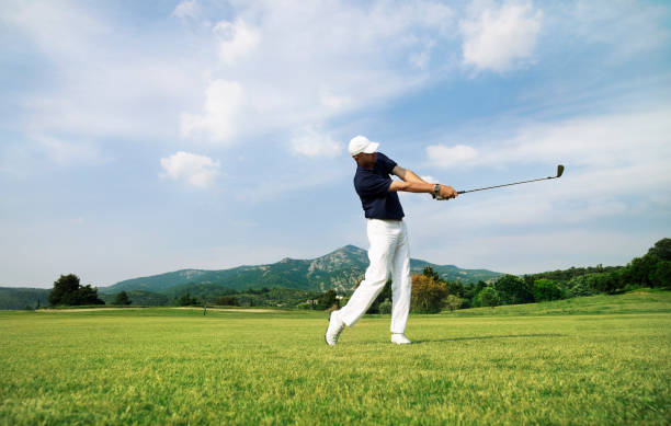 istock Golf Player. Perfect Swing on the Course. Moody Sky. 155597950