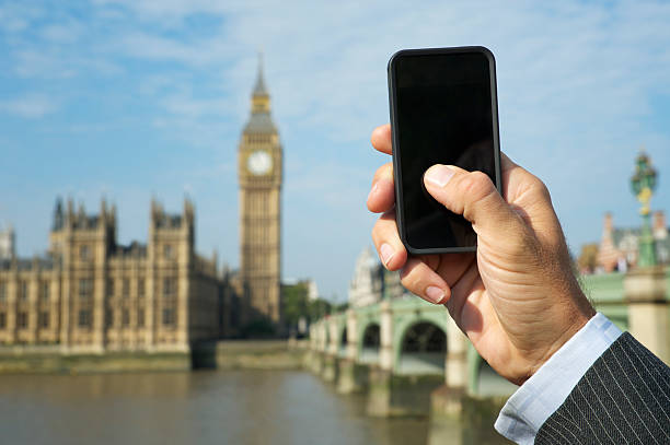 istock Businessman Uses Smartphone in London 155598130