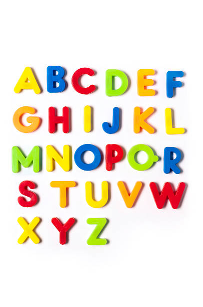 The British alphabet letters in plastic toy characters, white background stock photo