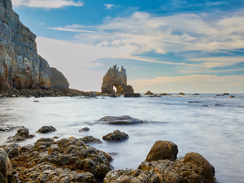 Portizuelo is a stony beach, with boulders and great beauty and interest for its picturesque landscape, which is located within the Protected Landscape of the West Coast.\n\nIt was the favourite walk of the Nobel Prize winner Severo Ochoa and was once the meeting point of the so-called ''maruyas'', village women who bathed dressed.\n\nFrom the town of Villar, and by a road of easy traffic by car, you discover the beach of Portizuelo - with quartzite edges and rocks of arbitrary shapes - where numerous painters have found in the so-called \