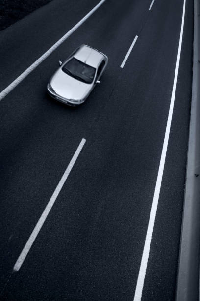 istock Driving in a lonely road 155598294