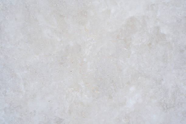 istock Light gray stone table organic texture background, white concret cement smooth surface floor 1555985160