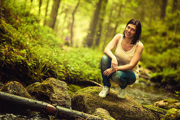 istock Beautiful brunette enjoying nature 155598590